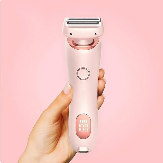 Pink and rose gold Dermao Gliss held in a hand against a pink background