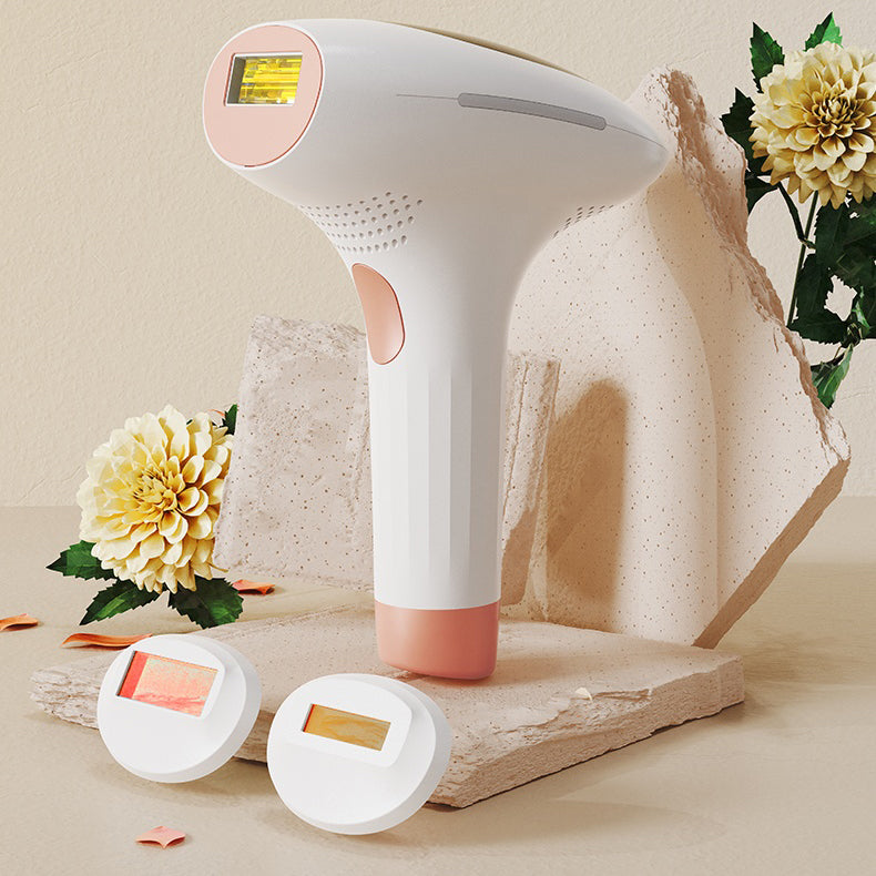 IPL hair removal device on a neutral background with flowers.