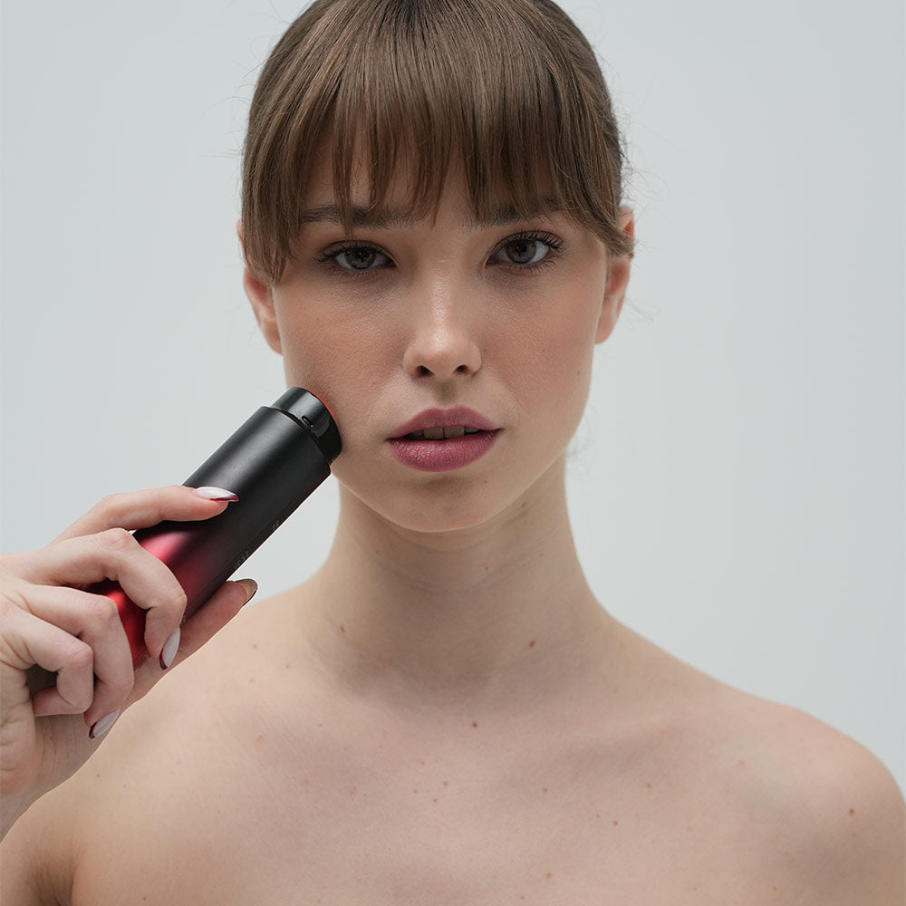 Front shot of woman using Dermao Radiance